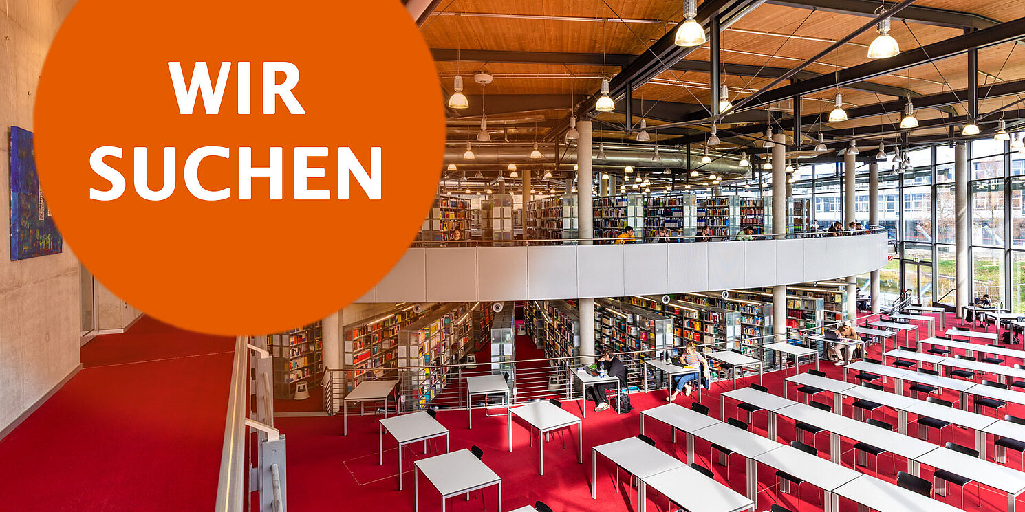 Bibliothekssaal mit der Aufschrift: Wir suchen